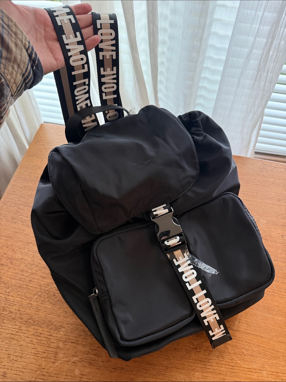 Black womens Nylon Backpack with 'LOVE' Accent Strap